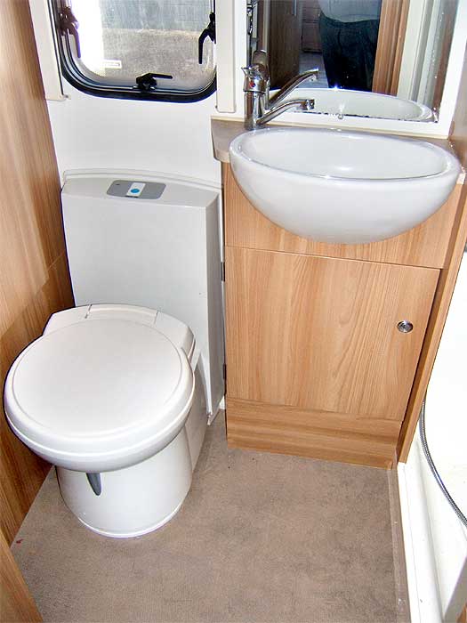 The Washroom with Cassette Toilet and Washbasin.